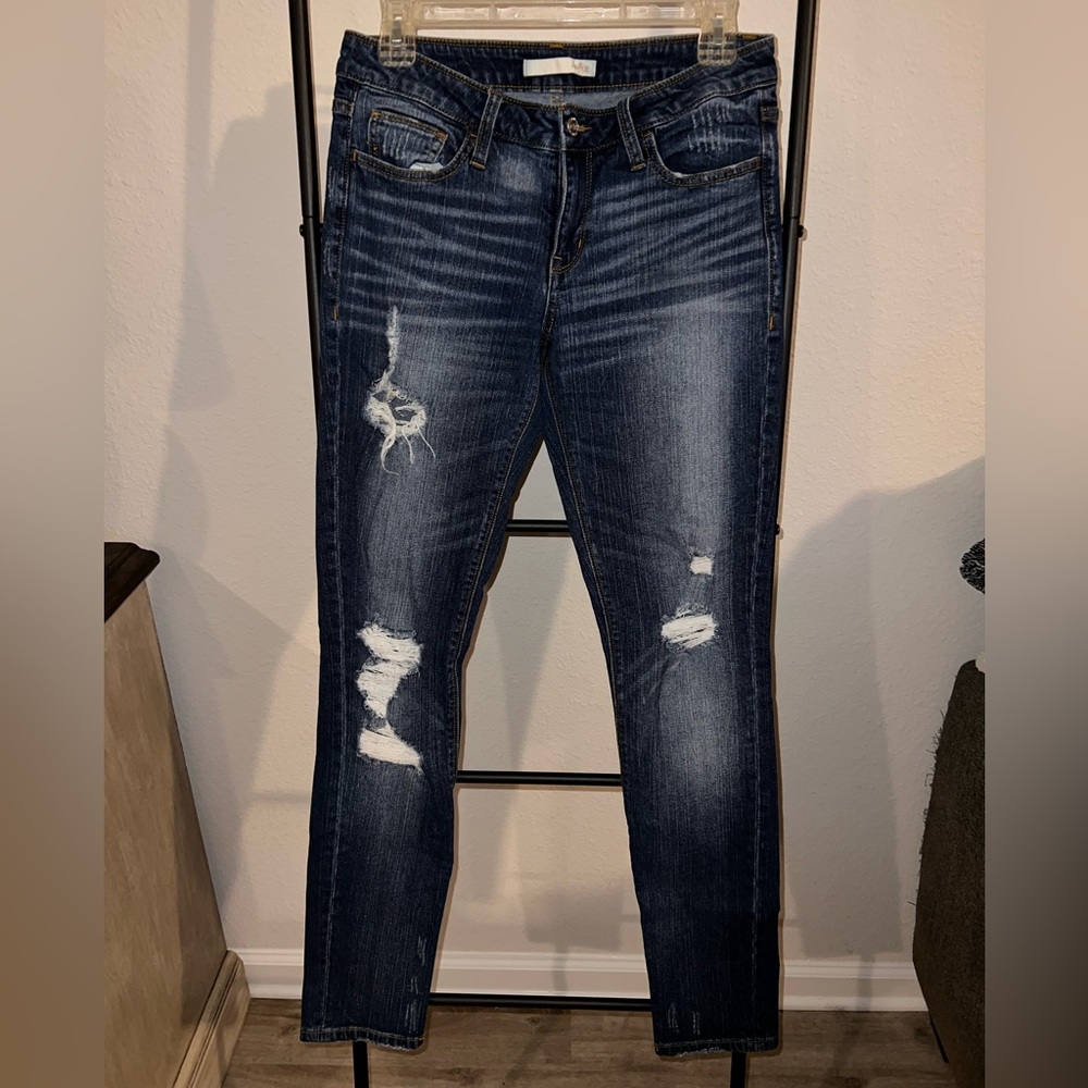 Buckle dark wash distressed skinny jeans